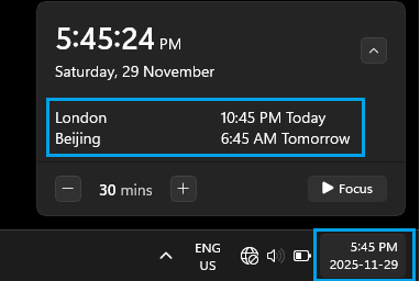Windows Taskbar Showing Clocks For London and Beijing